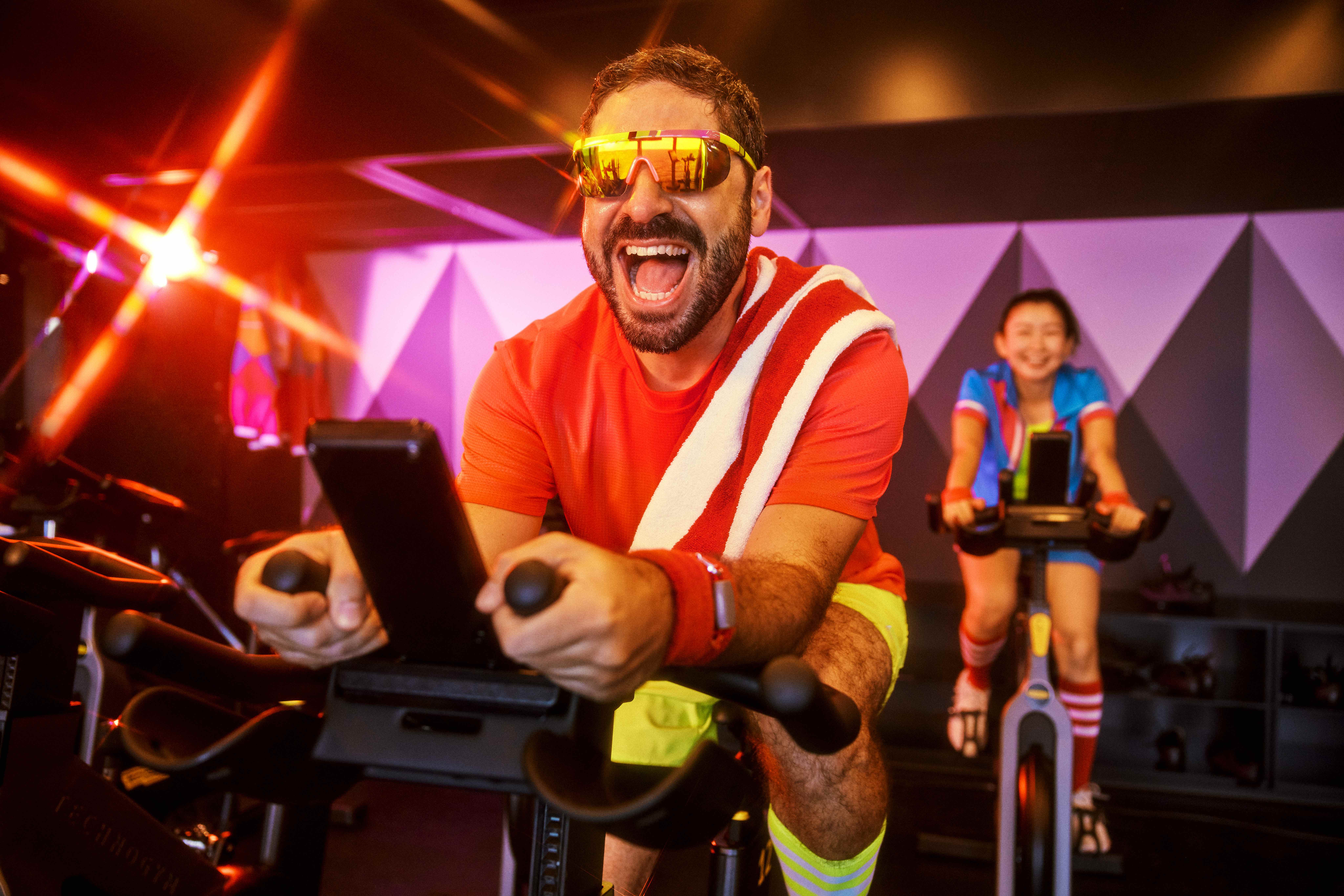 A Sailor smiles during a Spin Class