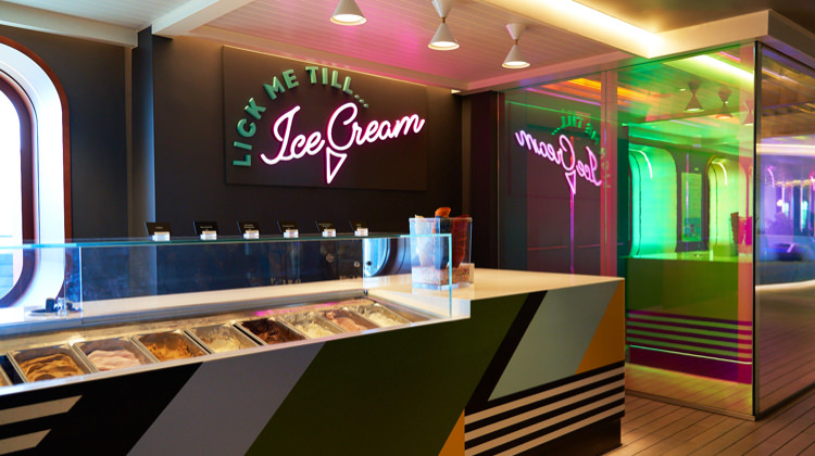 Our on board scoop shop, Lick Me Till... Ice Cream. Unique flavors of ice cream and cones are included and change daily.